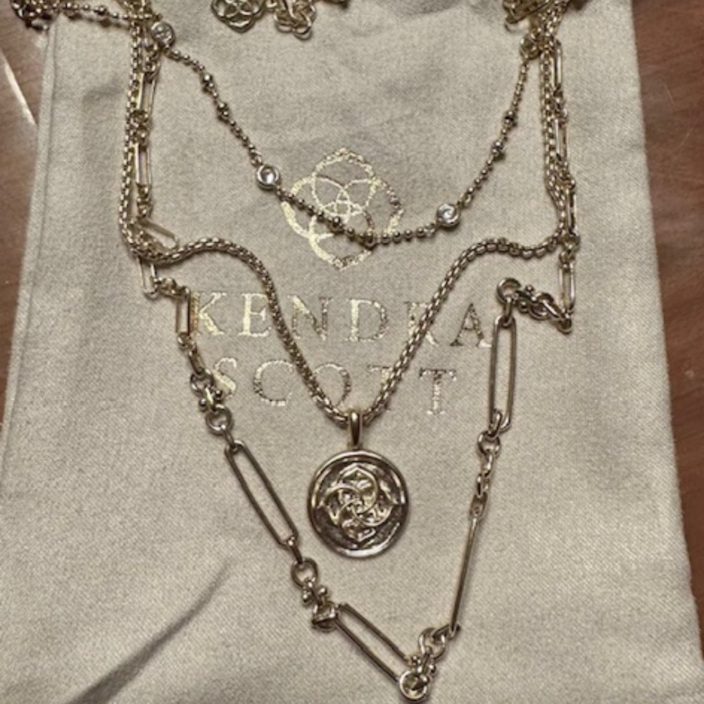 Two Mediallion Triple Strand Necklaces